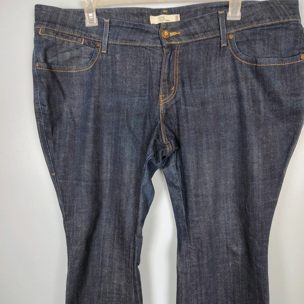 Levis 542 Flare Jeans Women 22M Dark Wash Blue Denim Distressed Hem Mid Rise y2k